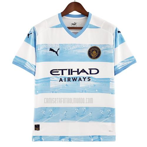 camiseta manchester city conmemorativo blanco azul 2022-2023